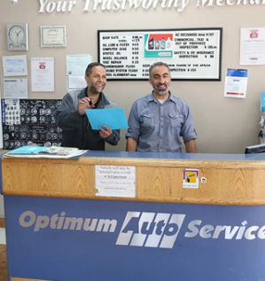 Optimum Auto Service team at the Edmonton shop reception desk