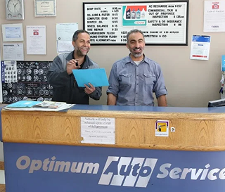 Optimum Auto Service team at the Edmonton shop reception desk
