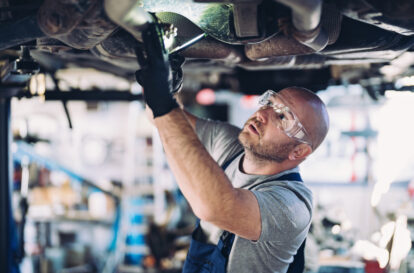 Mechanic working in auto repair shop